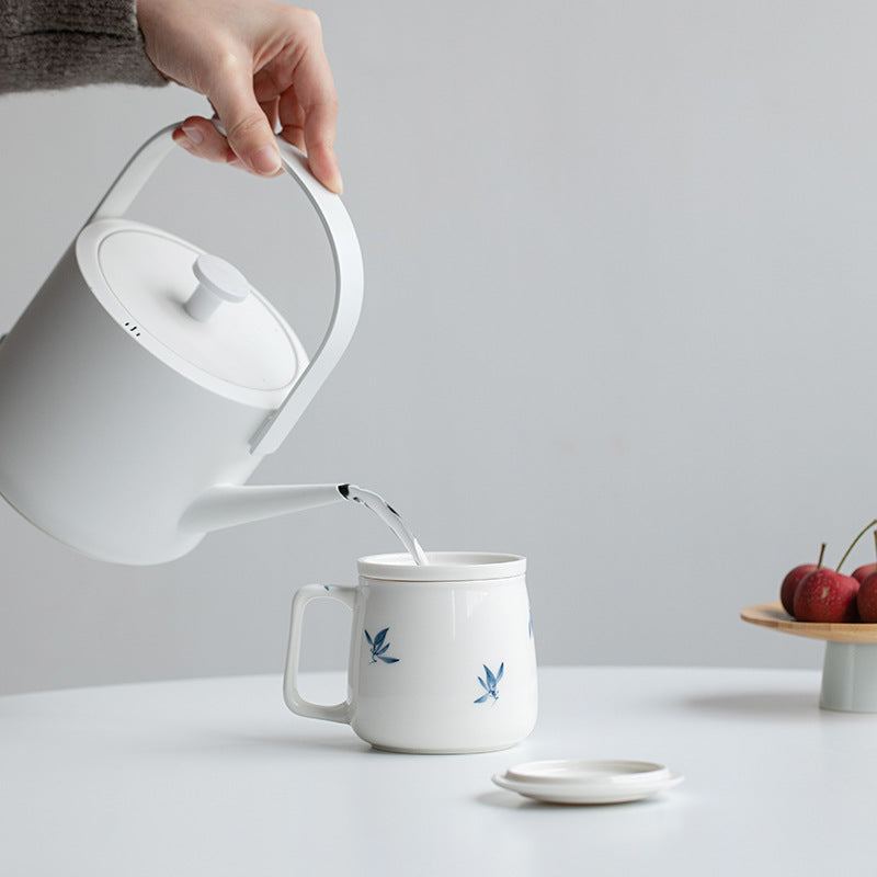 Porcelain Tea Mug with Infuser & Lid – Blue Leaf Pattern, 225ml